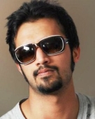 http://www.filmibeat.com/img/136x170/popcorn/profile_photos/atif-aslam-774.jpg