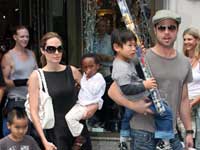 Brad and Angelina with their brood Brad and Angelina with their brood