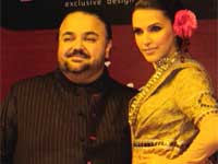 Neha Dhupia with designer Sanjeet Anand Neha Dhupia with designer Sanjeet Anand