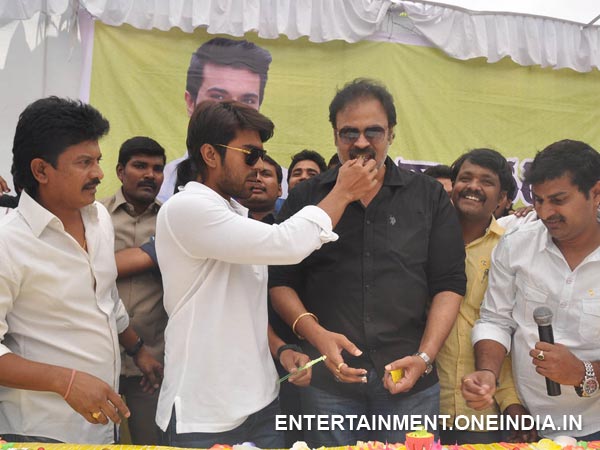 Ram Charan Sharing Cake Wit Nagababu At His 29th Birthday