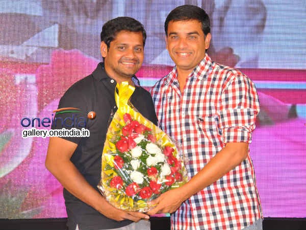 Bunny Vasu Presenting Bouquet To Dil Raju