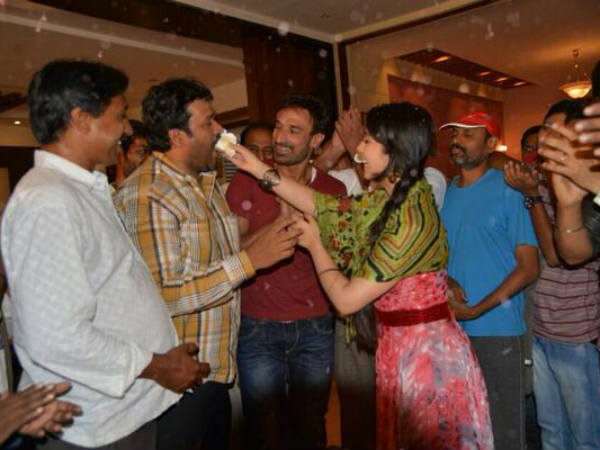 Charmi Kaur Feeding Cake To Her Manger Srinivas