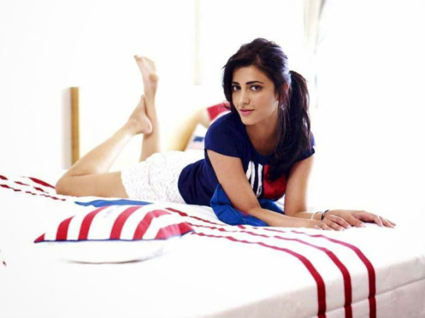 Shruti Hassan In Blue Shirt With White Skirt