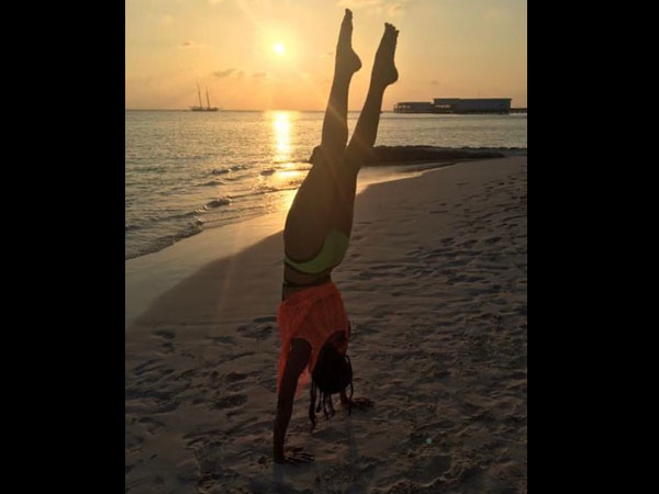 Malaika Arora Holidays In Spain & Visits The Beach In A Bikini. - Filmibeat