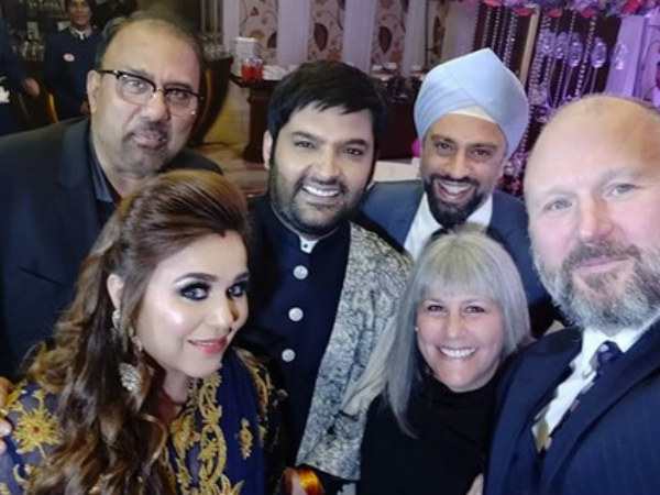 Kapil Posing With Guests