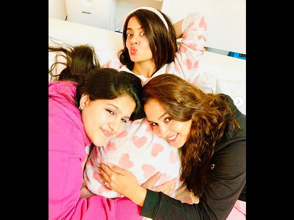 Surveen’s Friends Posing By Holding Her Baby Bump