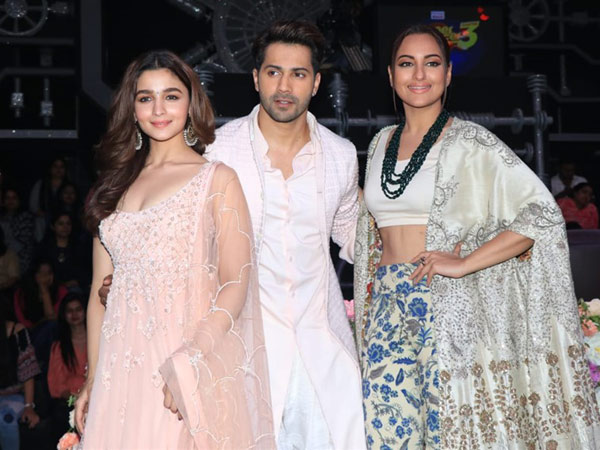 The Trio Pose For Cameras Together