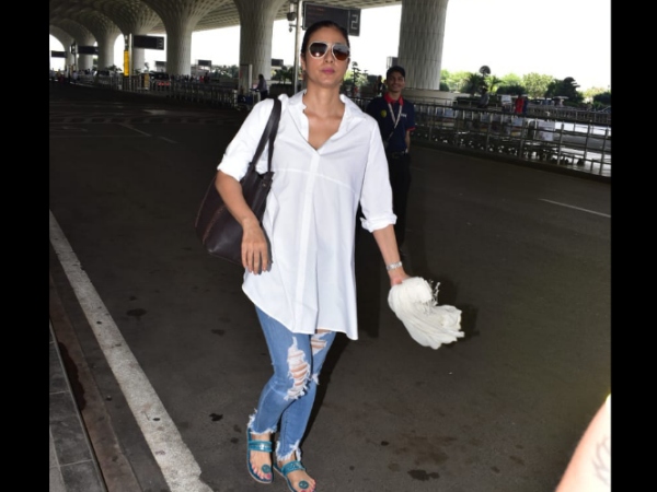 Tabu In A Classic White With Denim Look At The Airport