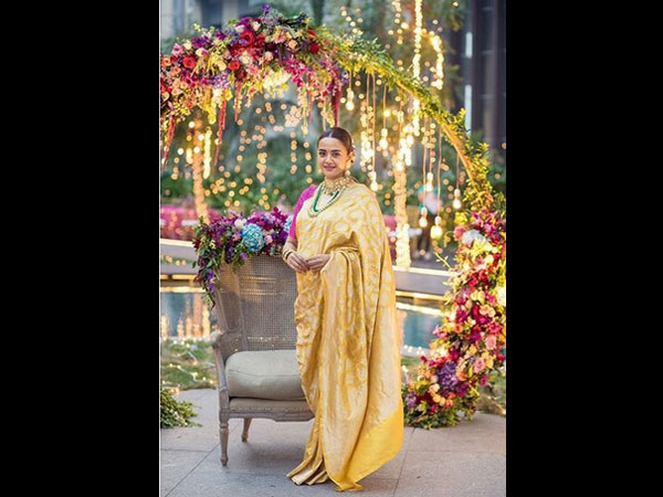 Surveen Glows In A Yellow Sari