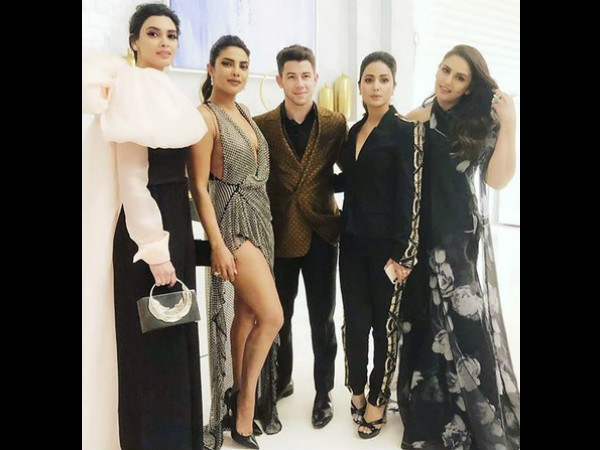 Hina Khan Poses With PC & Nick At Chopard Party