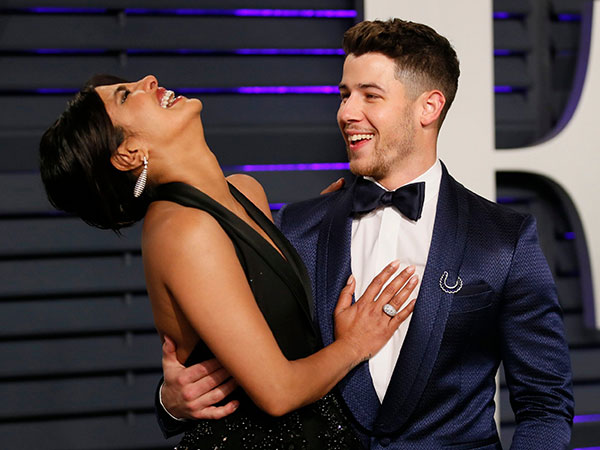 Priyanka & Nick Share A Light Moment At The 2019 Vanity Fair Oscar Party