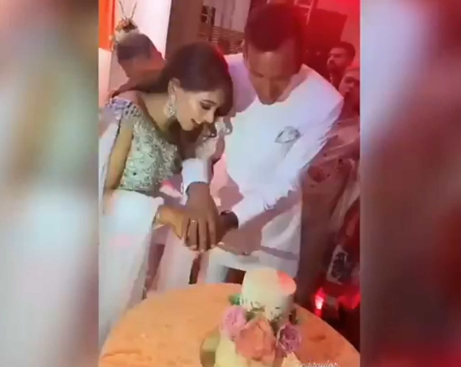 The Couple Cut The Cake