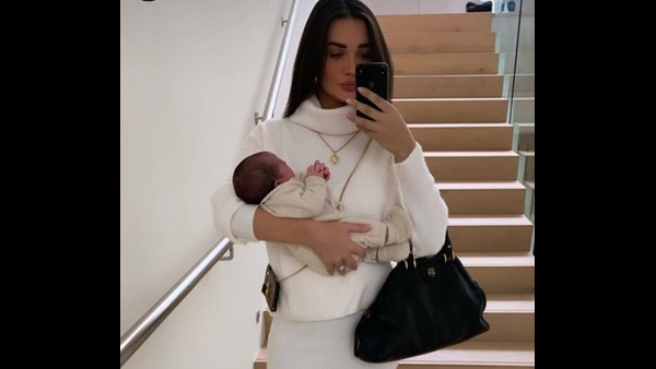 The New Mommy With Her Tiny Tot