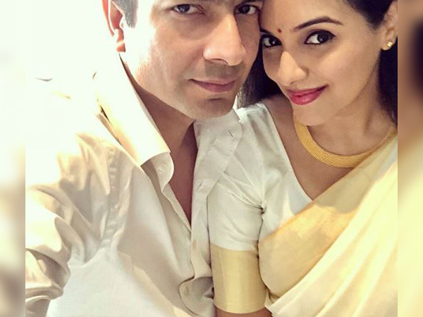 The Lovely Couple In Traditional Attire