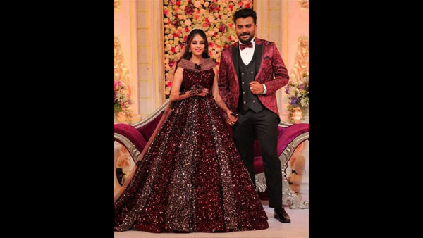 Niveditha And Chandan Twin In Maroon